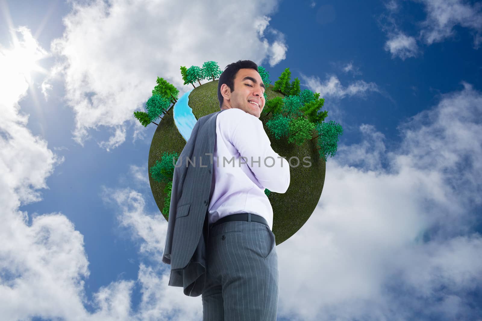 Composite image of smiling businessman standing