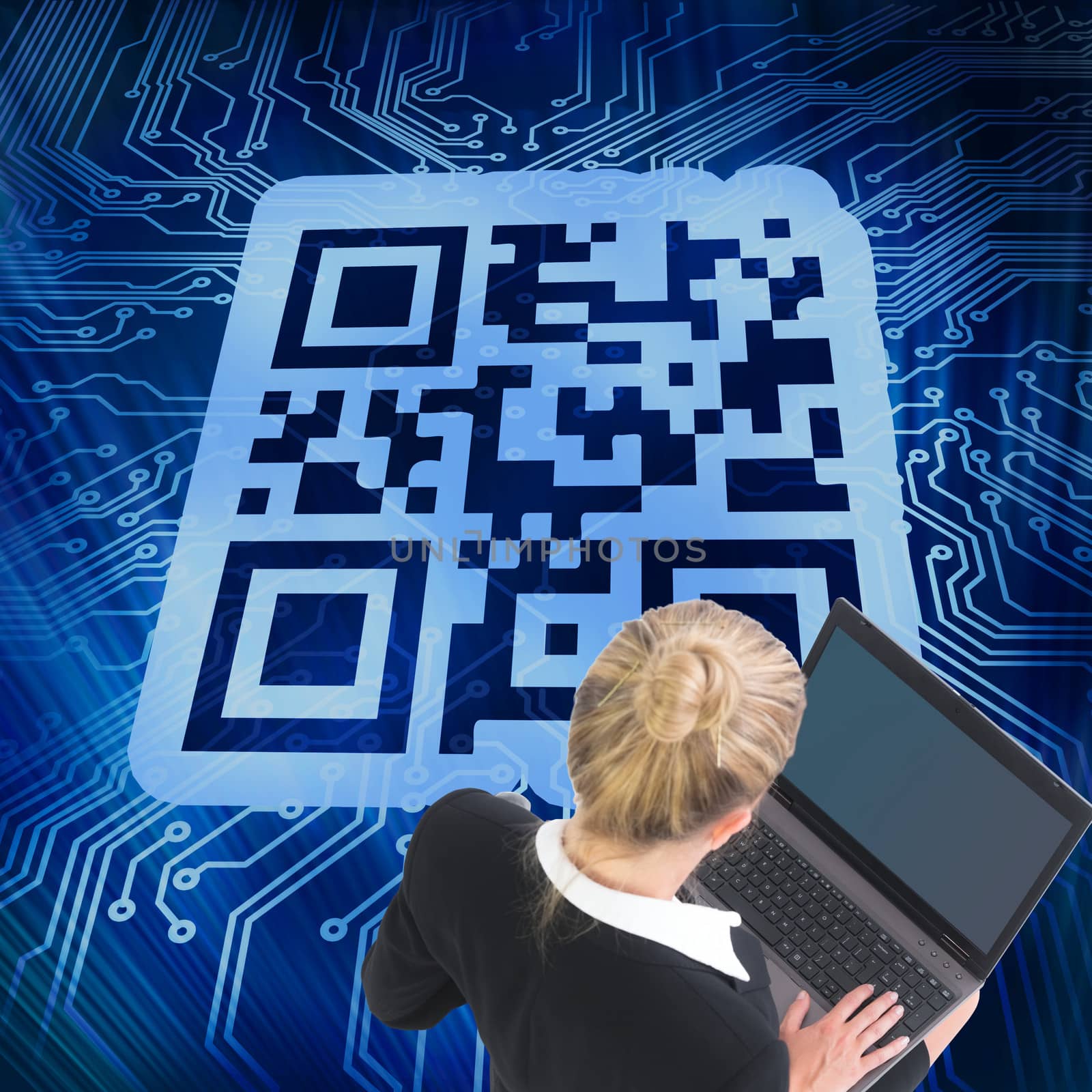 Composite image of blonde businesswoman using laptop