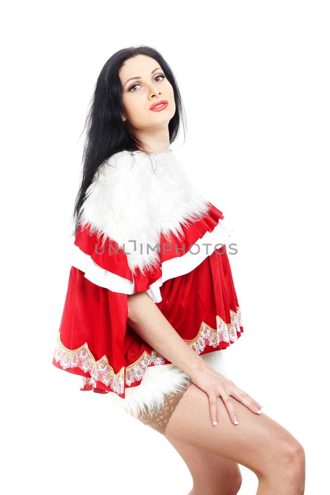 Sexy lady in the warm furry Christmas dress on a white background