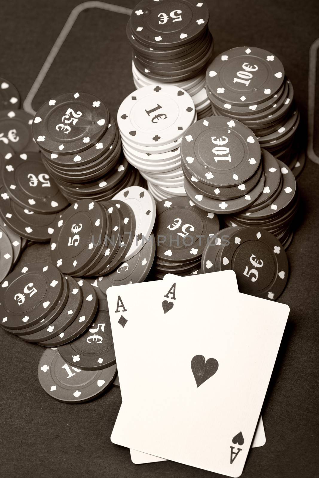 Old poker cards and chips. Sepia toned