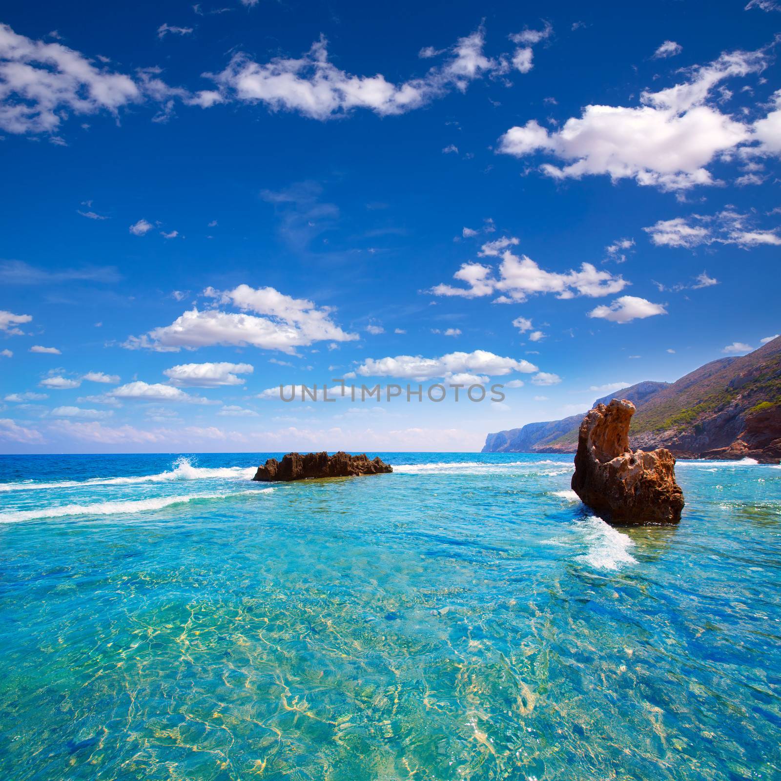 Denia Alicante Las rotas rocky beach in Spain by lunamarina