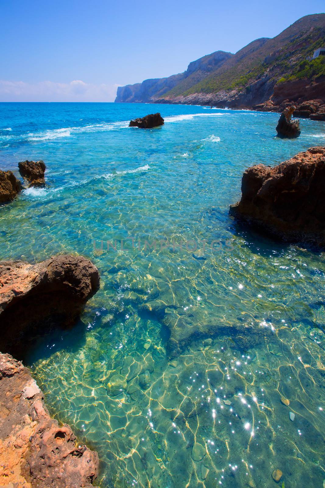 Denia Alicante Las rotas rocky beach in Spain by lunamarina