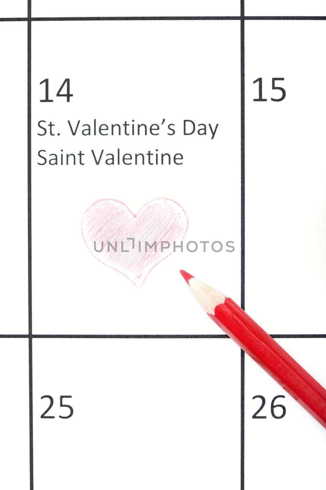 Red pencil on a calendar with Saint Valentine Day