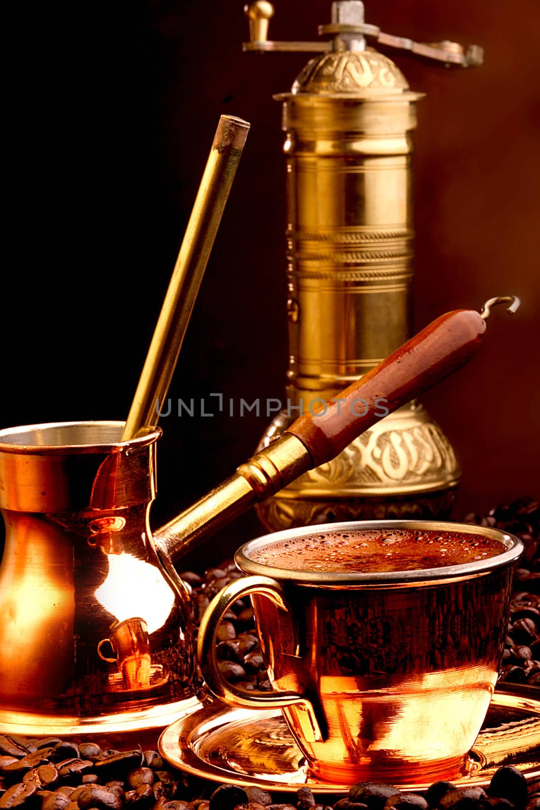 Cup of turkish coffe with pot and coffee grinder aside by DiVal