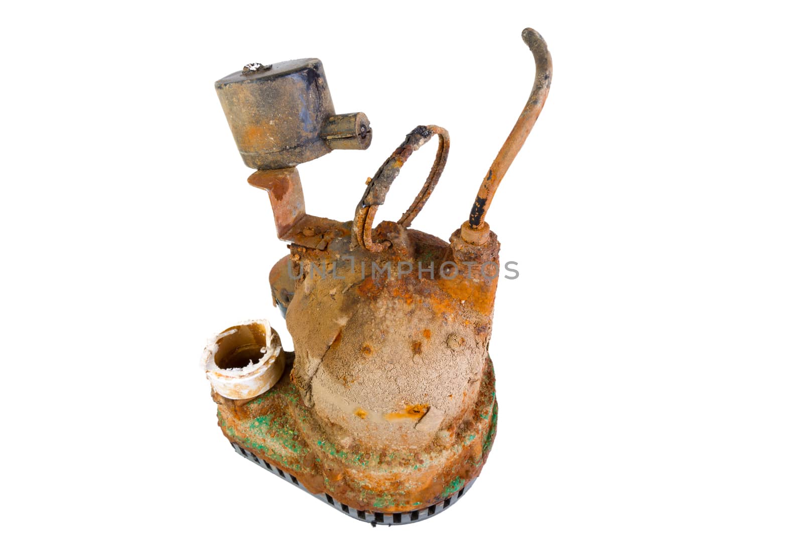 Old broken rusty sump pump that has been removed from a drainage sump as obsolete, isolated on white