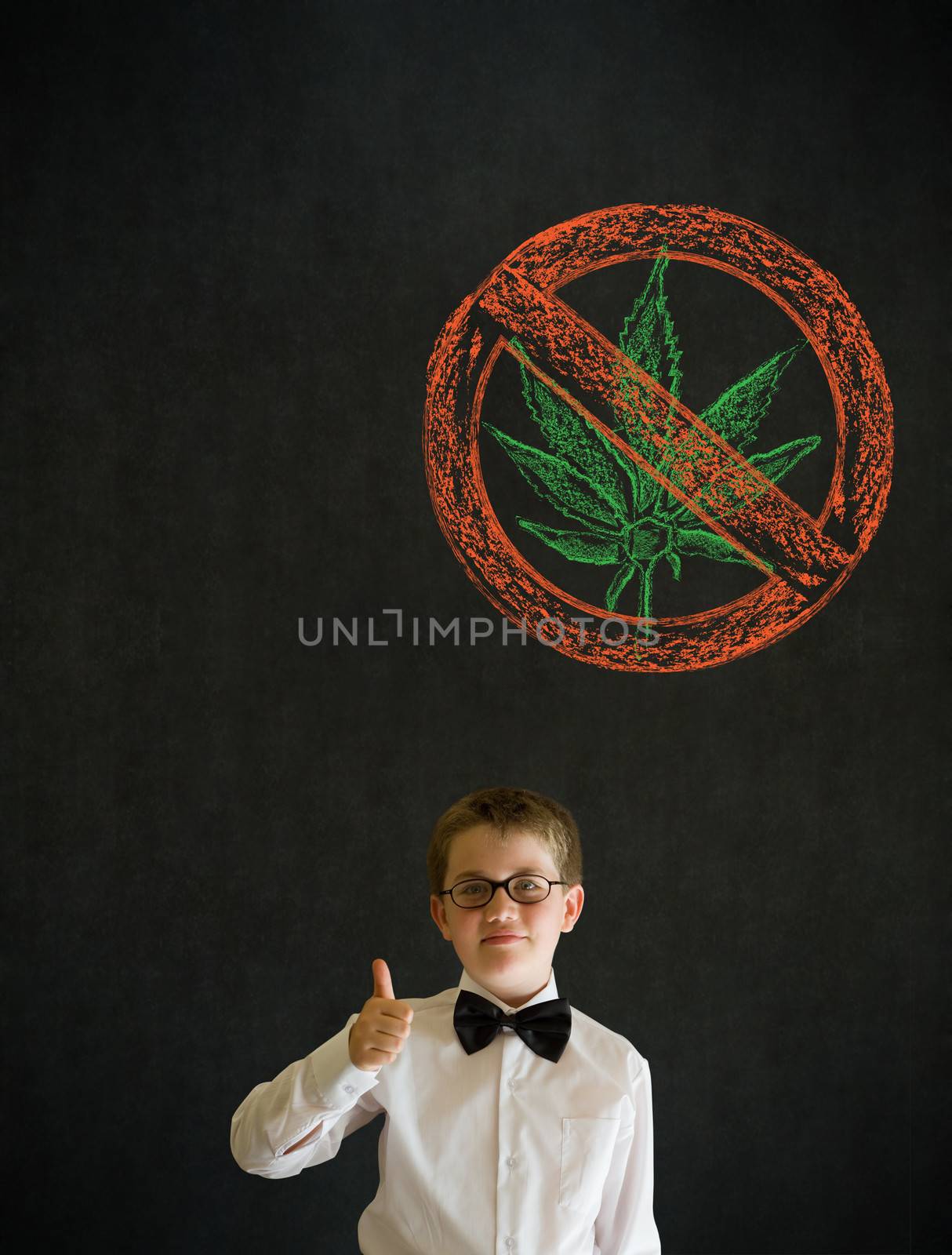 Thumbs up boy dressed up as business man with no weed marijuana on blackboard background