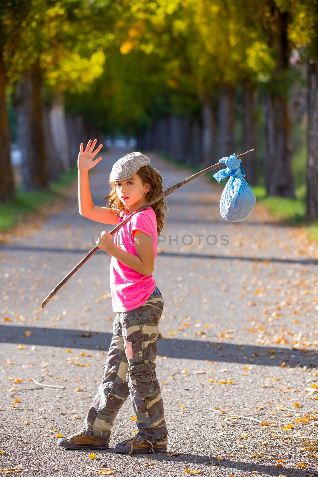 little kid with hobo stick bag and bundle girl saying goodbye by lunamarina