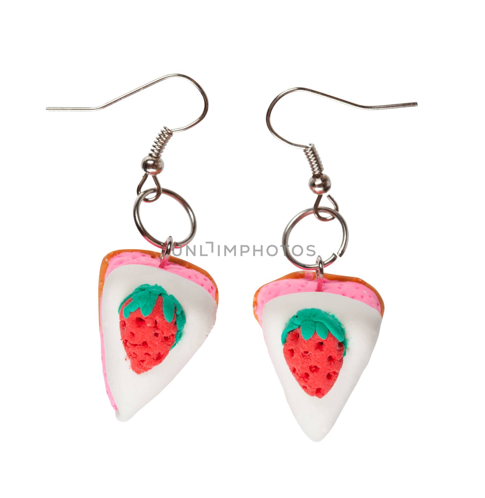 Earrings made of plastic in the form of the cake with strawberry. Isolated on white background.