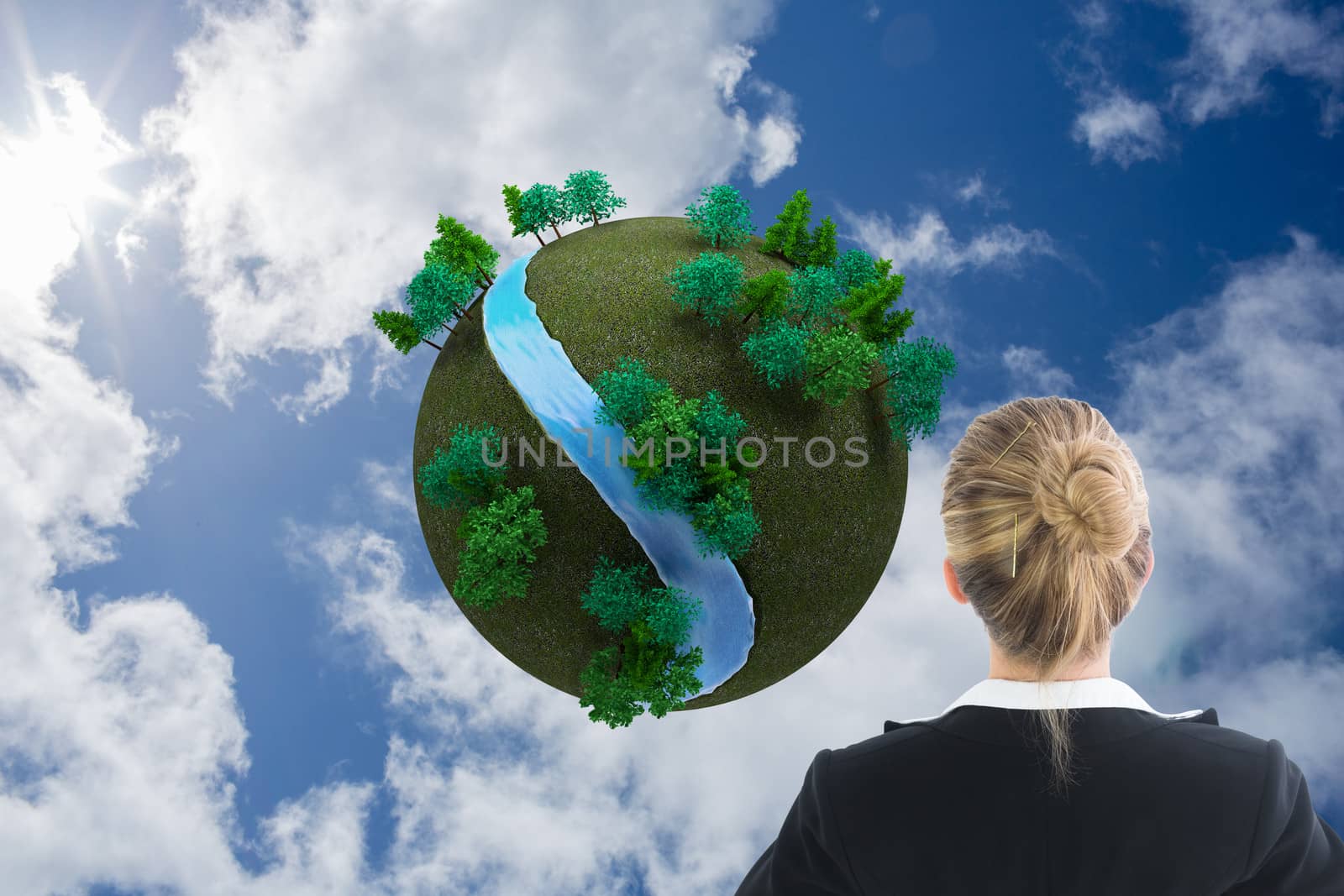 Composite image of businesswoman standing  by Wavebreakmedia