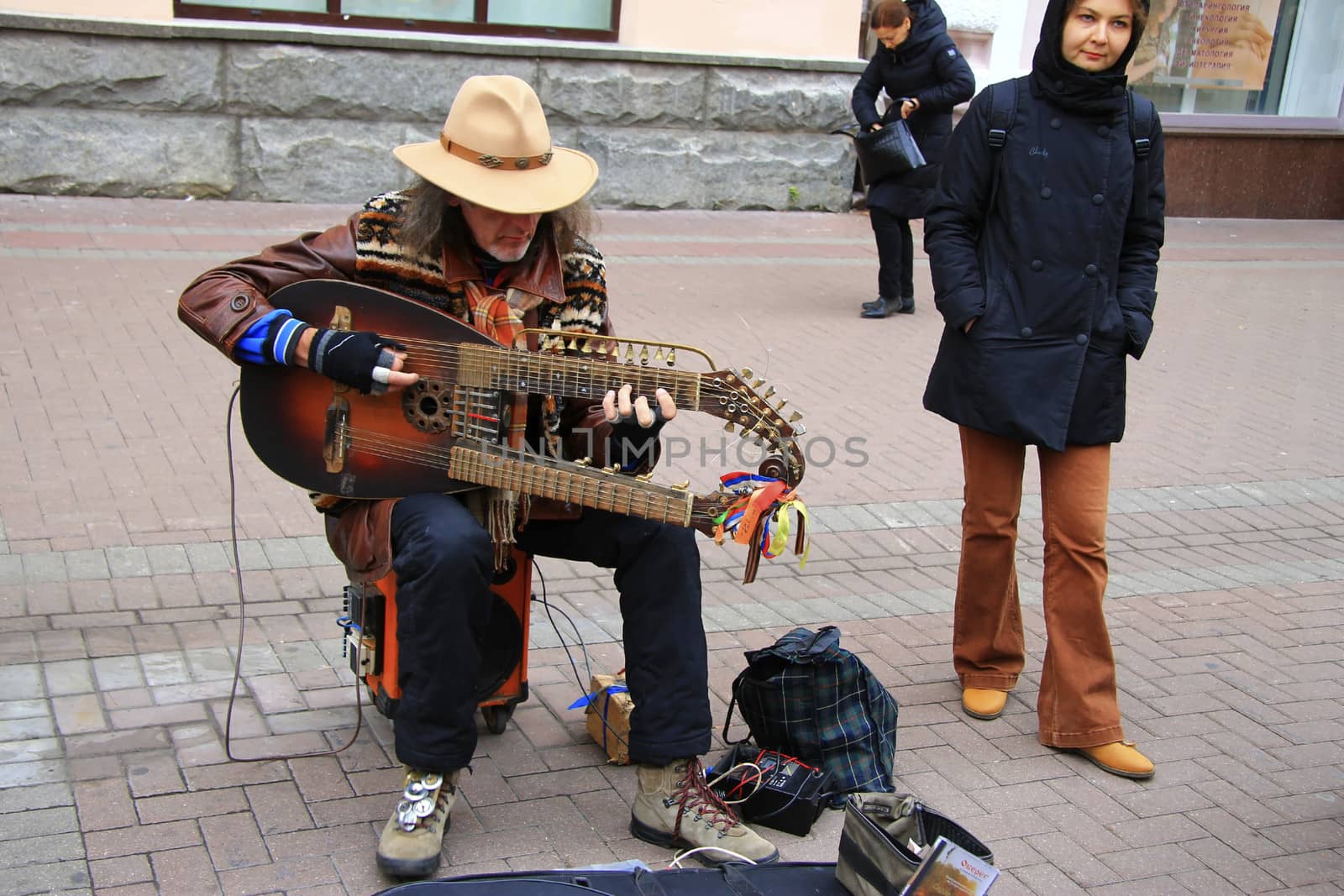 Street musician playing on the Arbat street Moscow