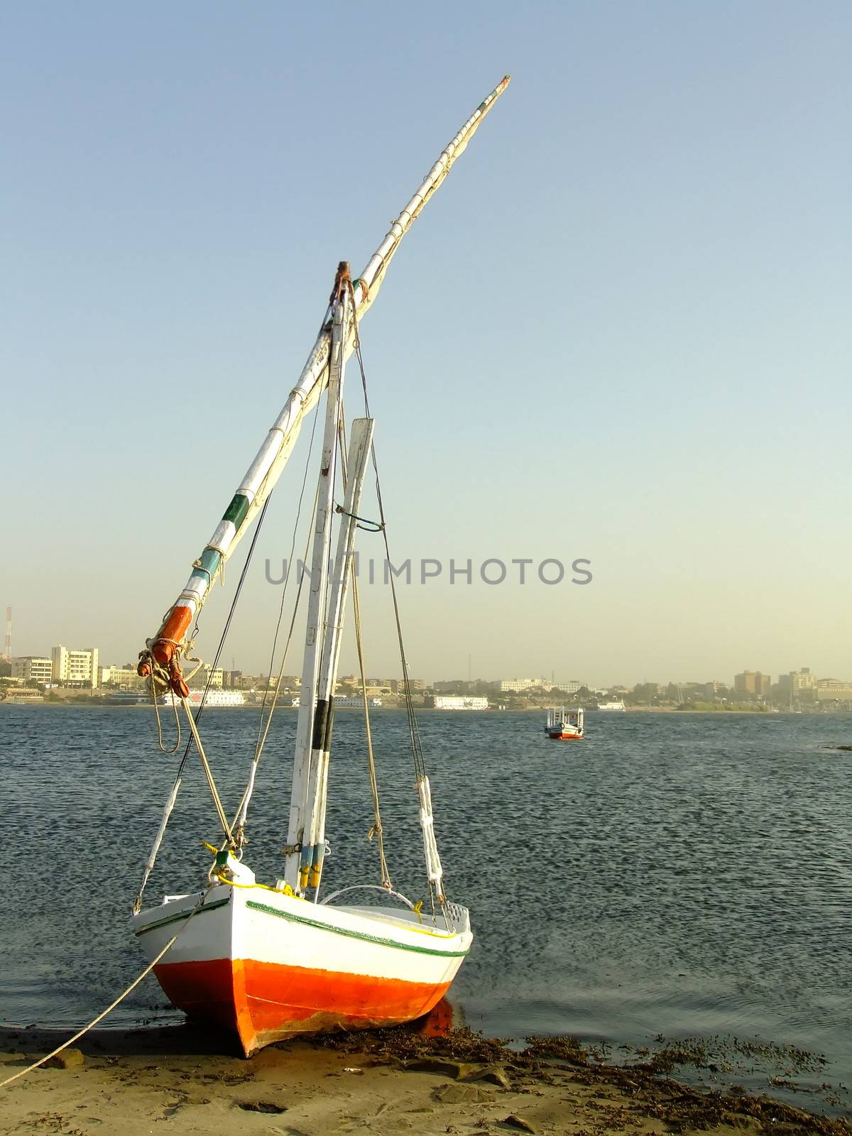 Felucca boat on the Nile river bank, Aswan, Egypt