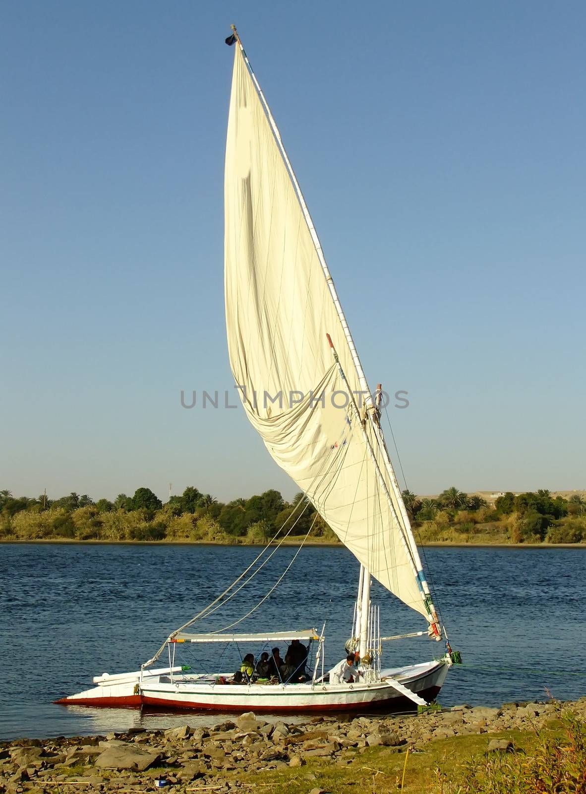 Felucca boat on the Nile river bank, Aswan, Egypt