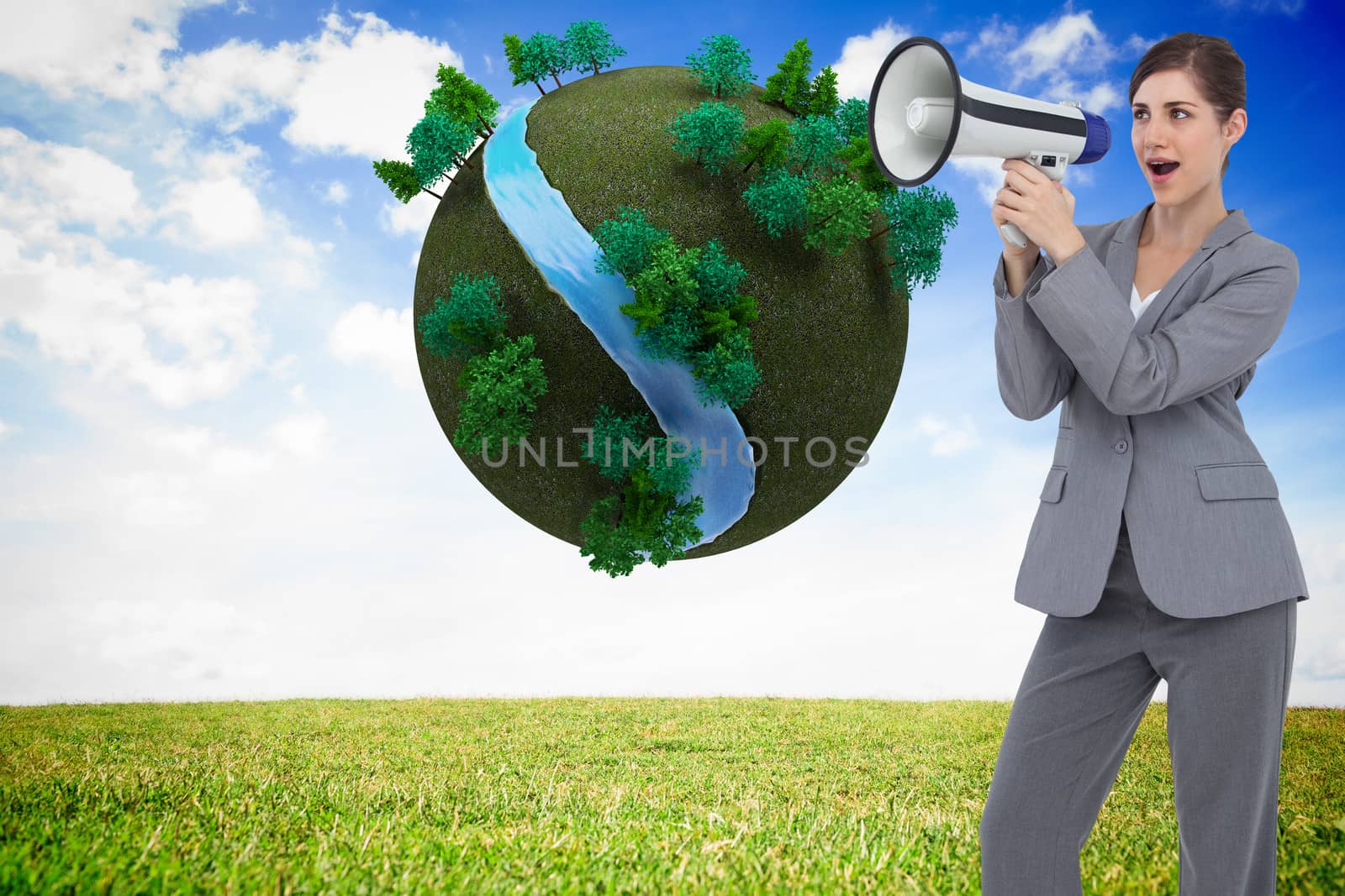 Composite image of businesswoman with loudspeaker