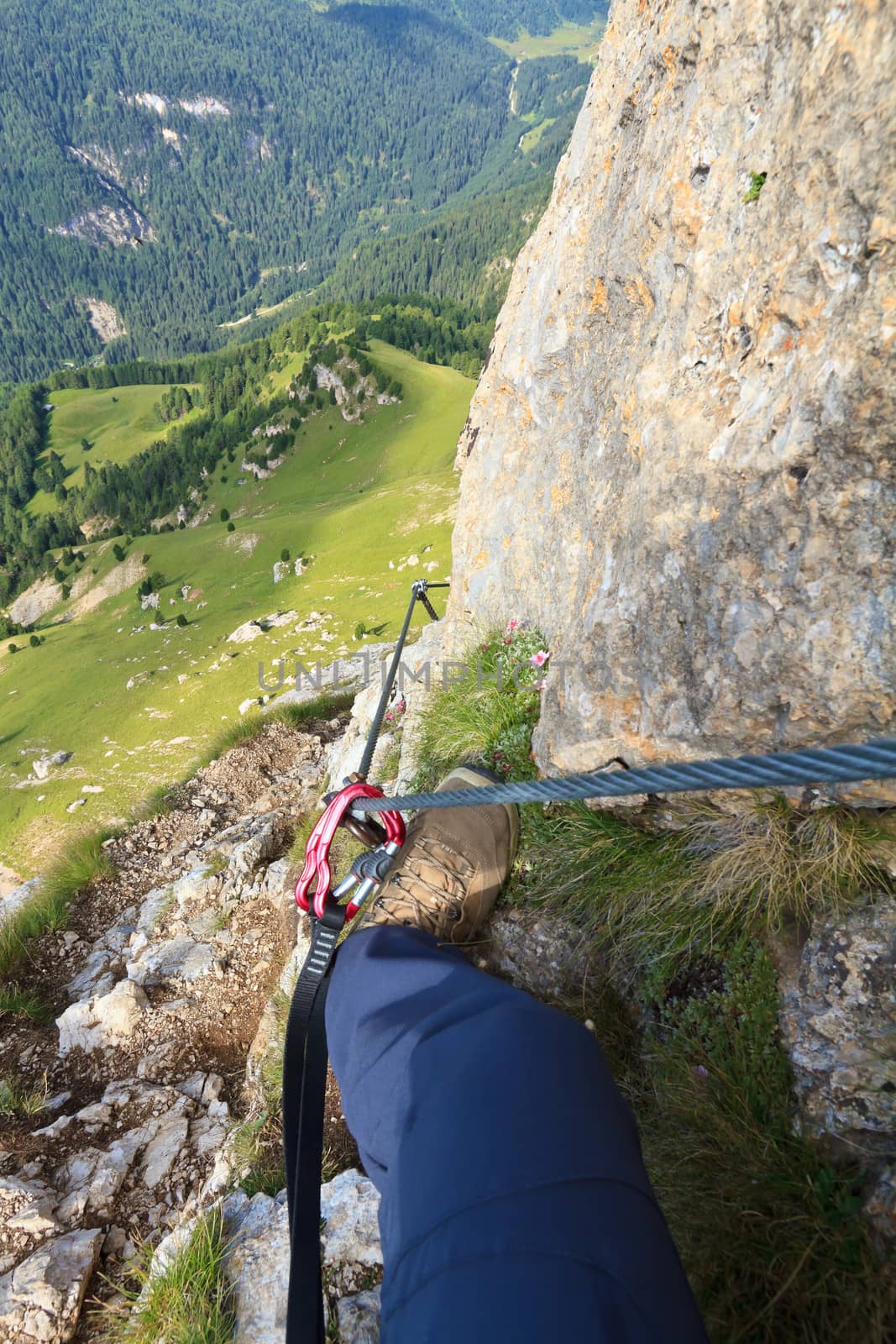 hiker in Col Rodellal Via ferrata, Italian Dolomites