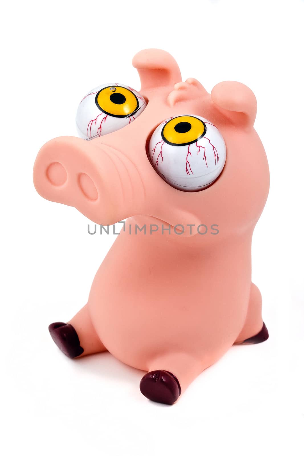 Funny pig toy (pink), isolated on white background