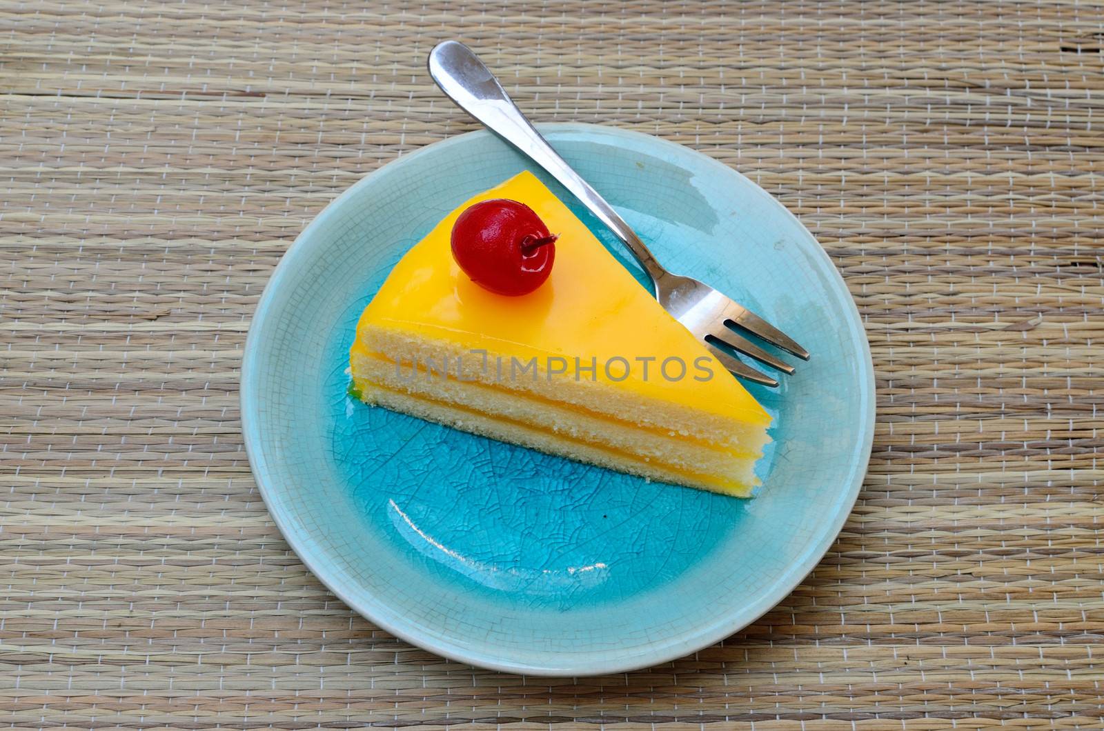 Orange cake in blue dish, Dessert time