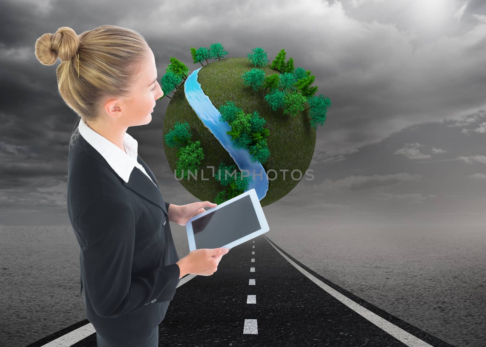 Composite image of businesswoman holding tablet by Wavebreakmedia