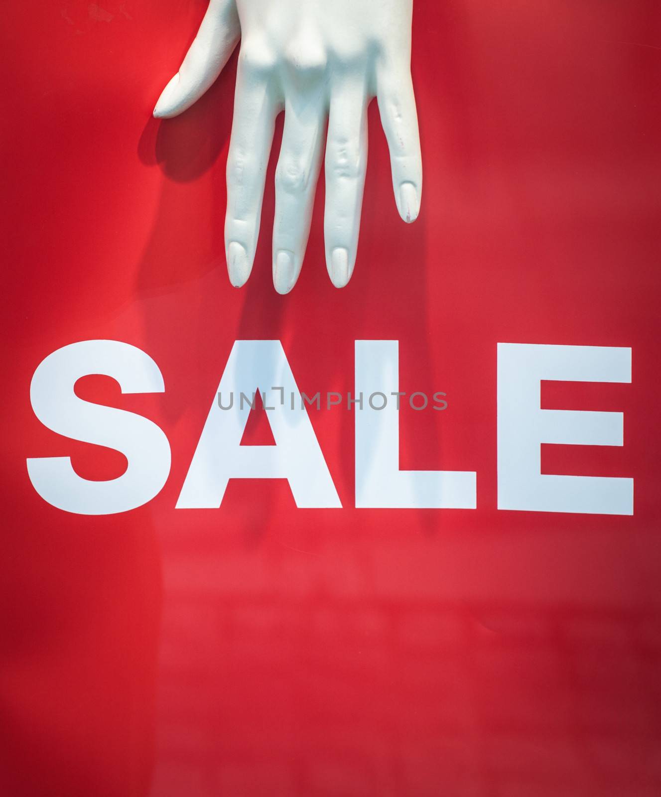 A Mannequin Hand And Sale Sign Retail Store Display