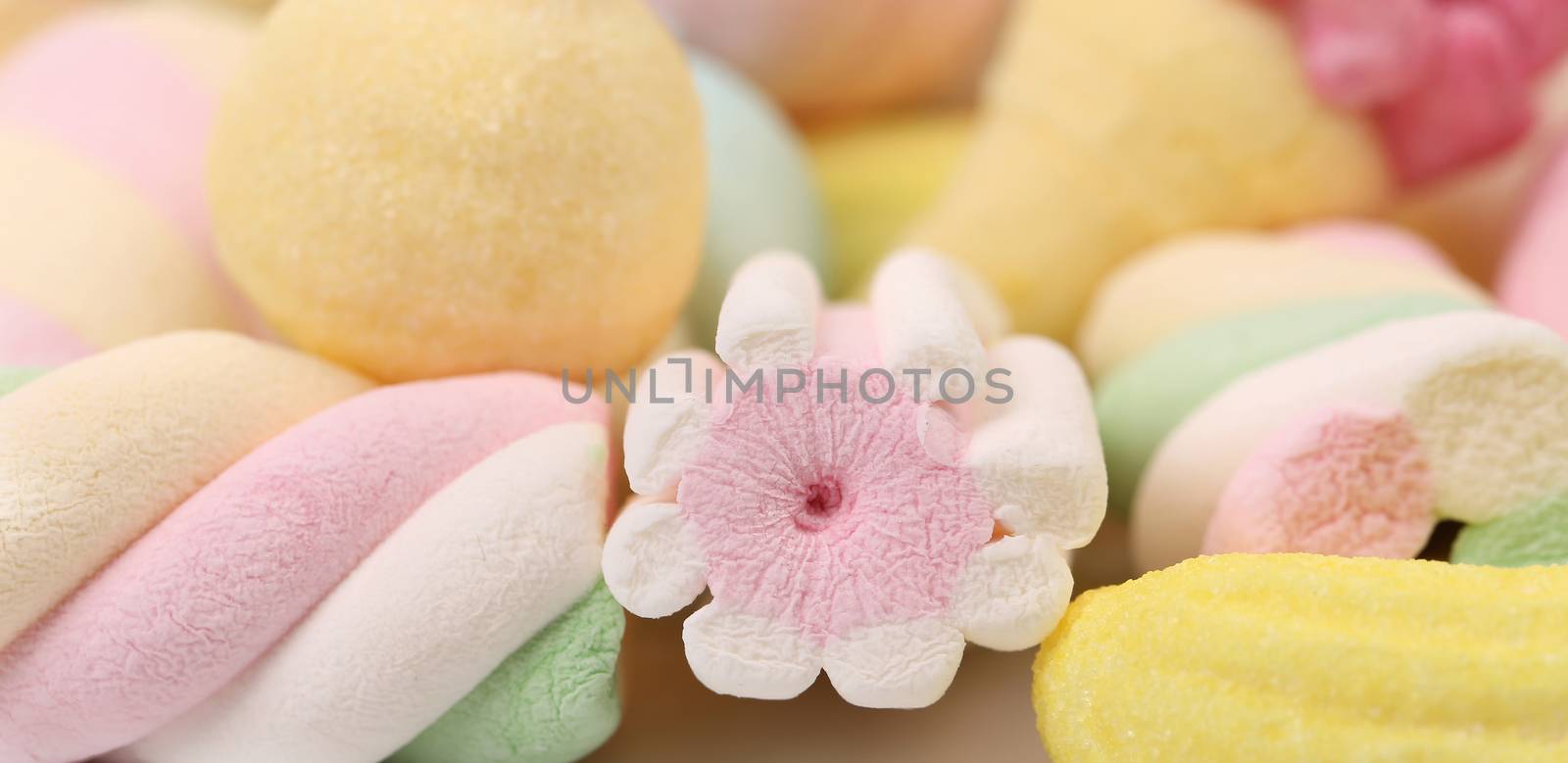 Different colorful marshmallow. Close up. Whole background.