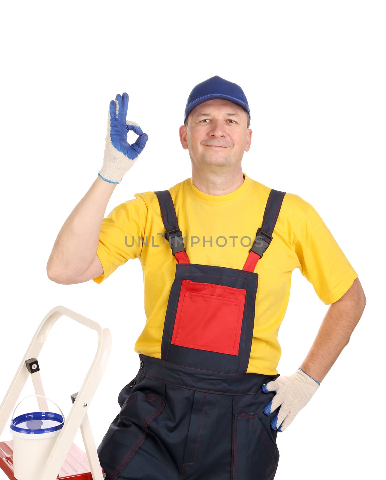 Worker on ladder showing sign okey. Isolated on a white background.