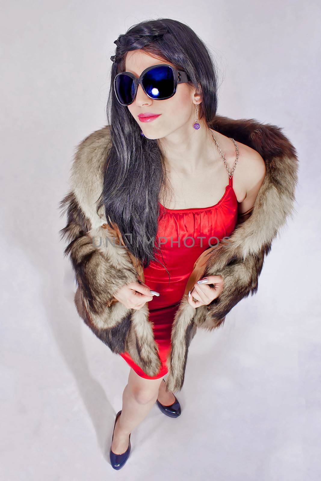 portrait of attractive woman in fur coat