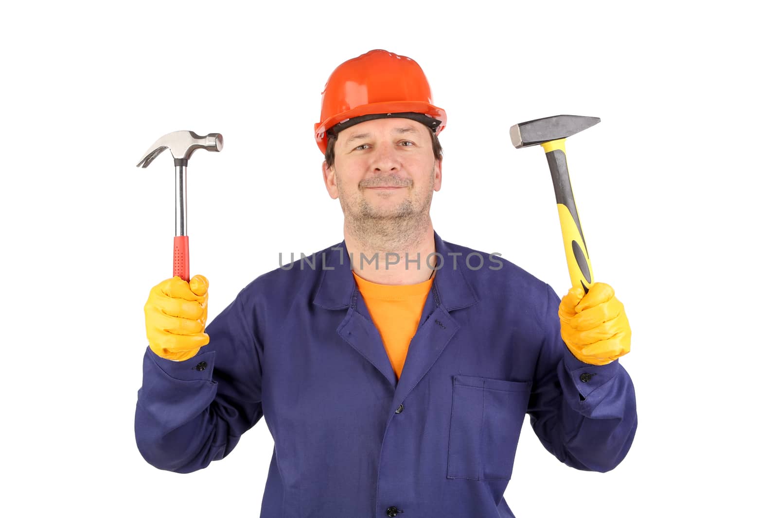 Worker in hard hat holding hammers. by indigolotos