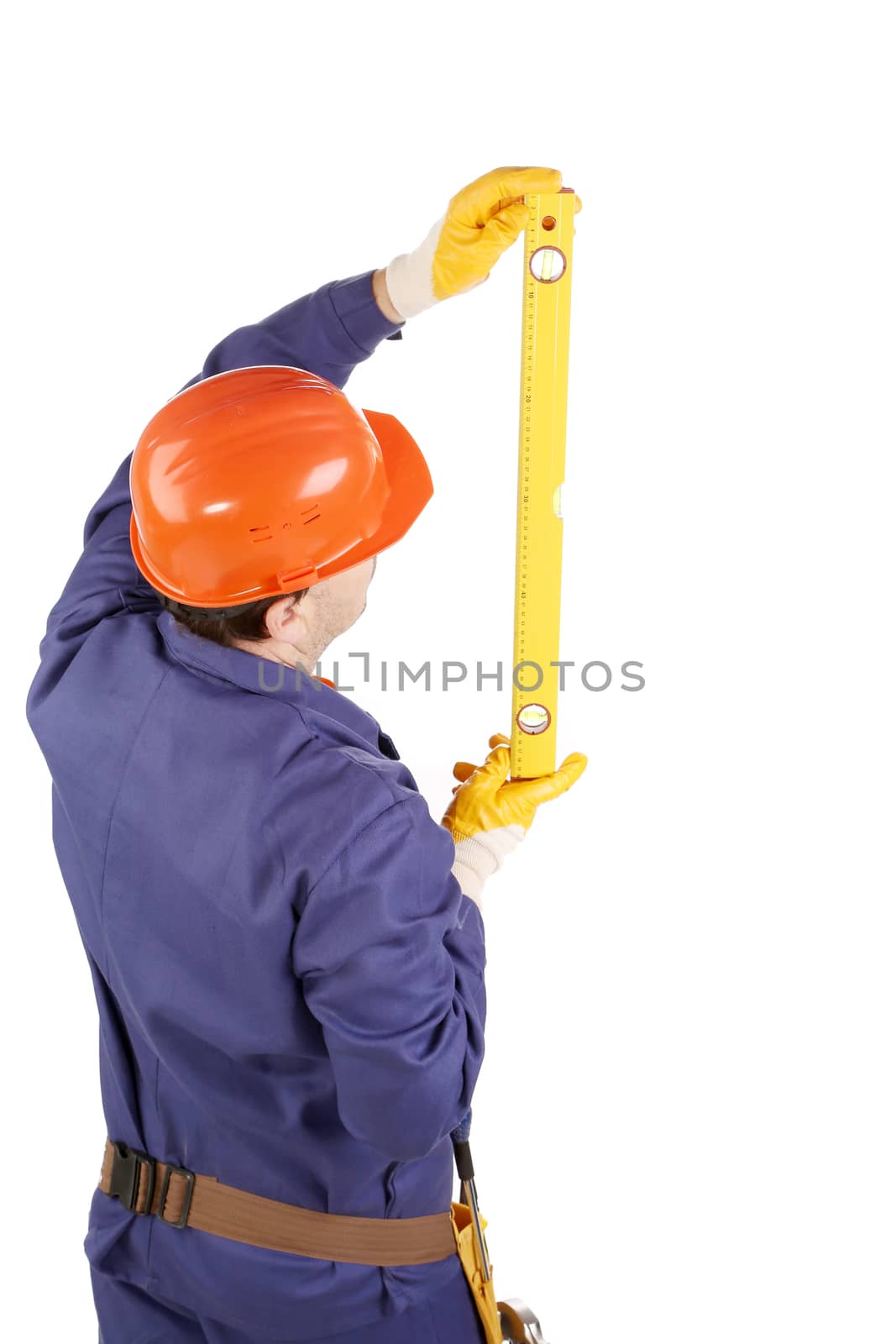 Worker in hard hat raising ruler. Isolated on a white background.