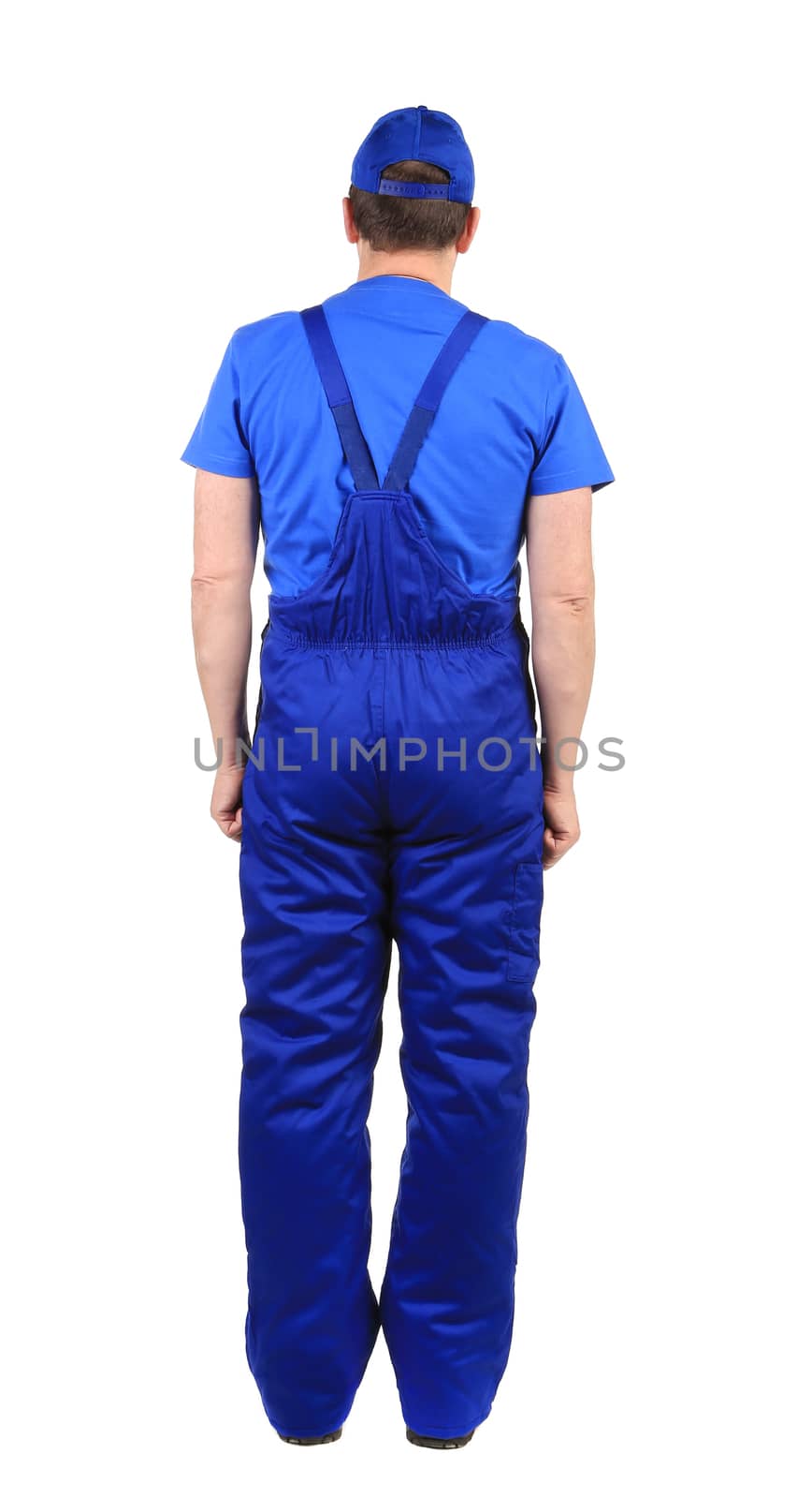 Worker in blue overalls. Back view. Isolated on a white background.