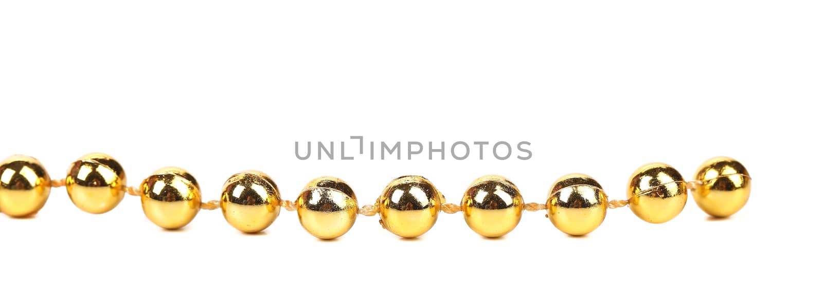 Decorative golden beads. Horisontal. by indigolotos