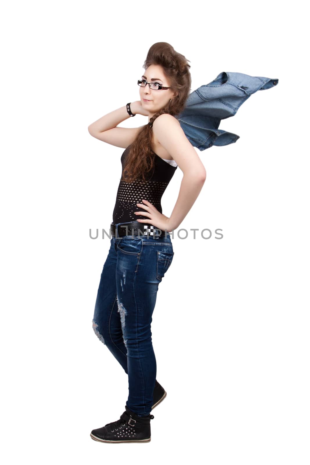 Teenage girl in a blue jeans dress, overcomes his jacket over his shoulder, isolated on white background