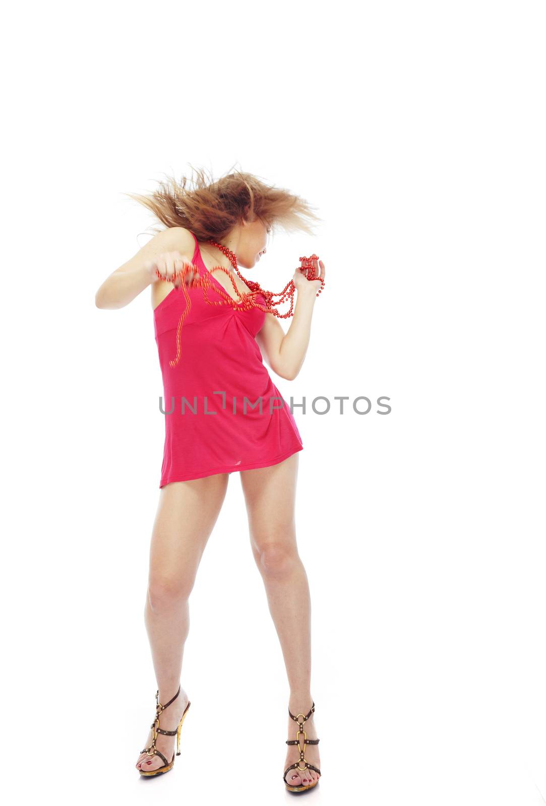 Dancing lady in the red dress on a white background