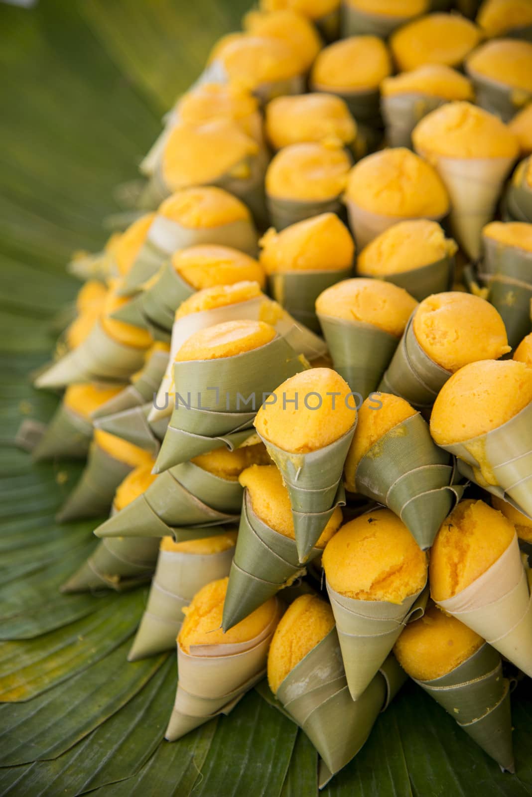 Toddy palm cake in leaf2 by gjeerawut
