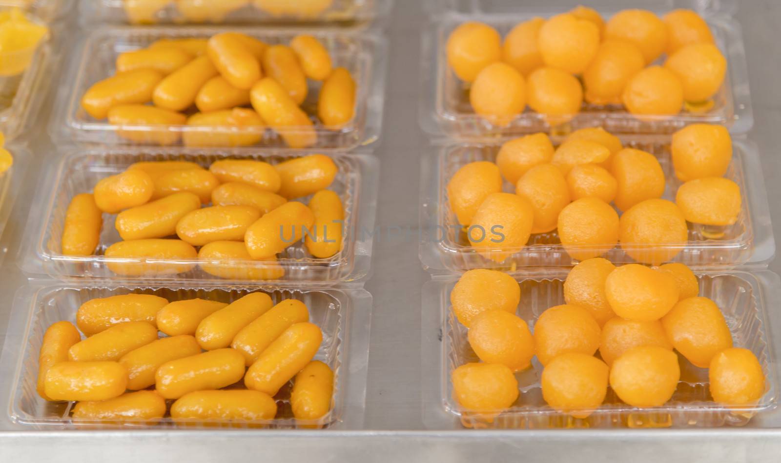Gold Egg Yolks Drops in pack for sale by gjeerawut
