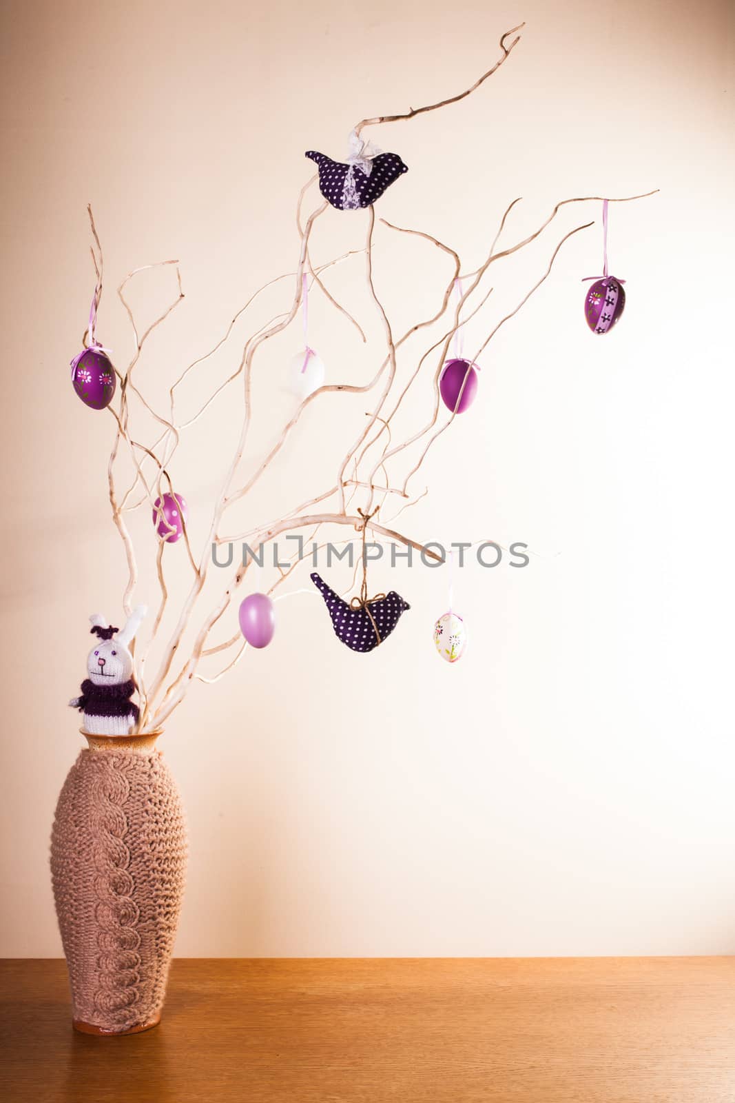 Handmade easter decorations on the branches in vase