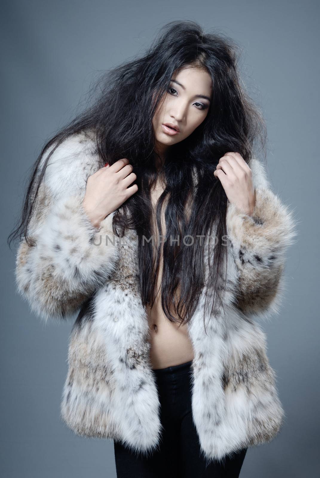 Asian beauty in fur coat by Novic