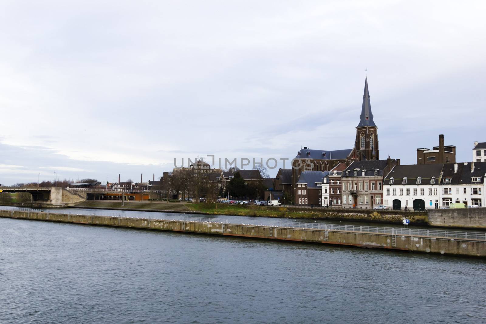 Panorama of Maastricht, Netherlands in cloudy calm winter day by Tetyana