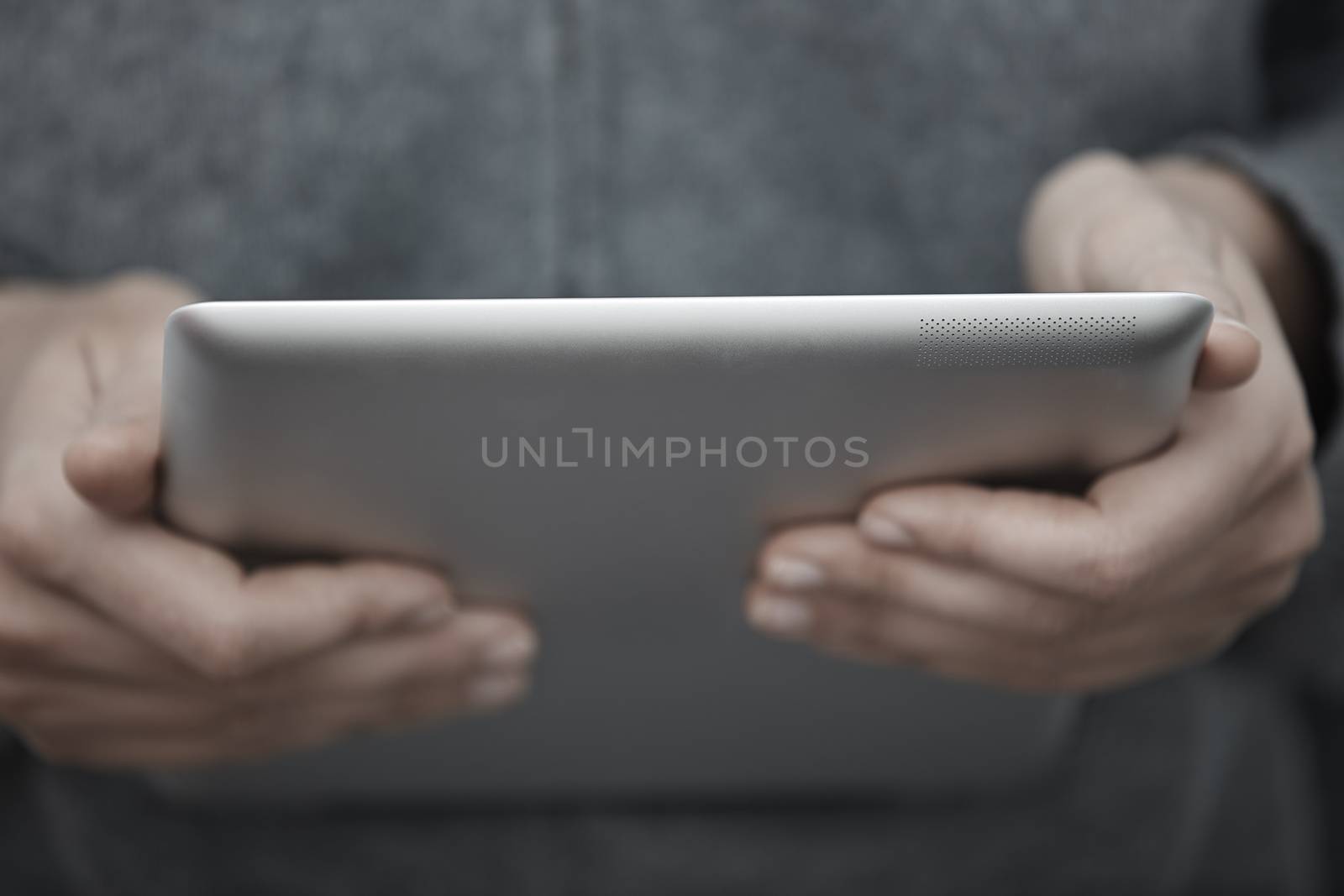 Human hands with tablet PC. Close-up view