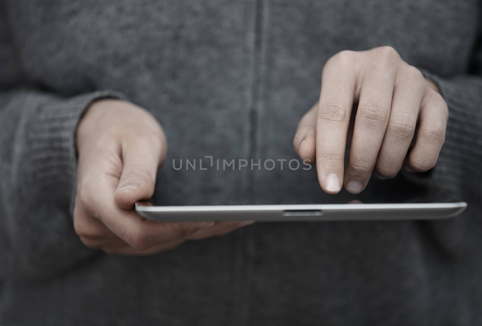 Human hands with tablet PC. Close-up view