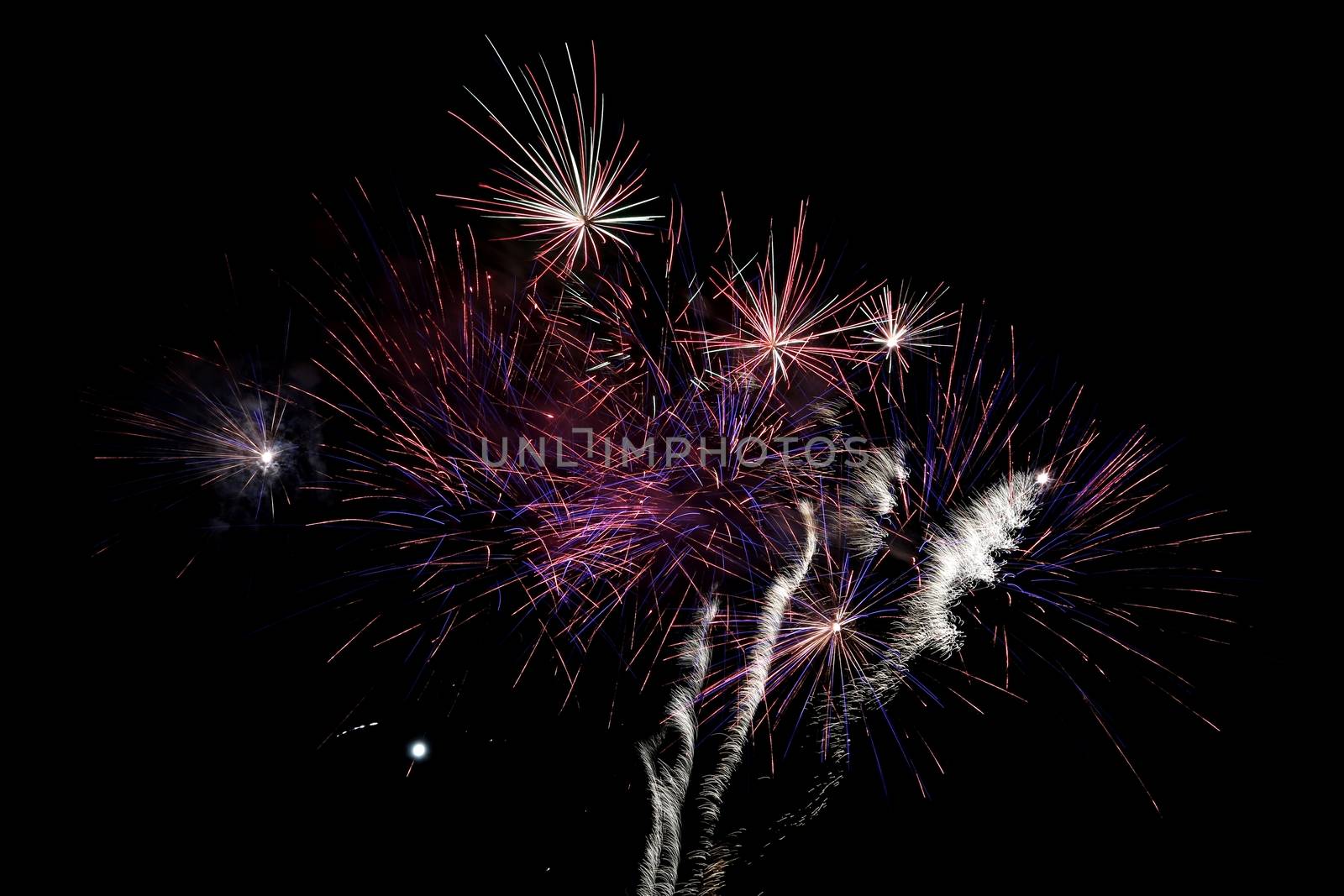 Magnificent fireworks display exploding across the night sky