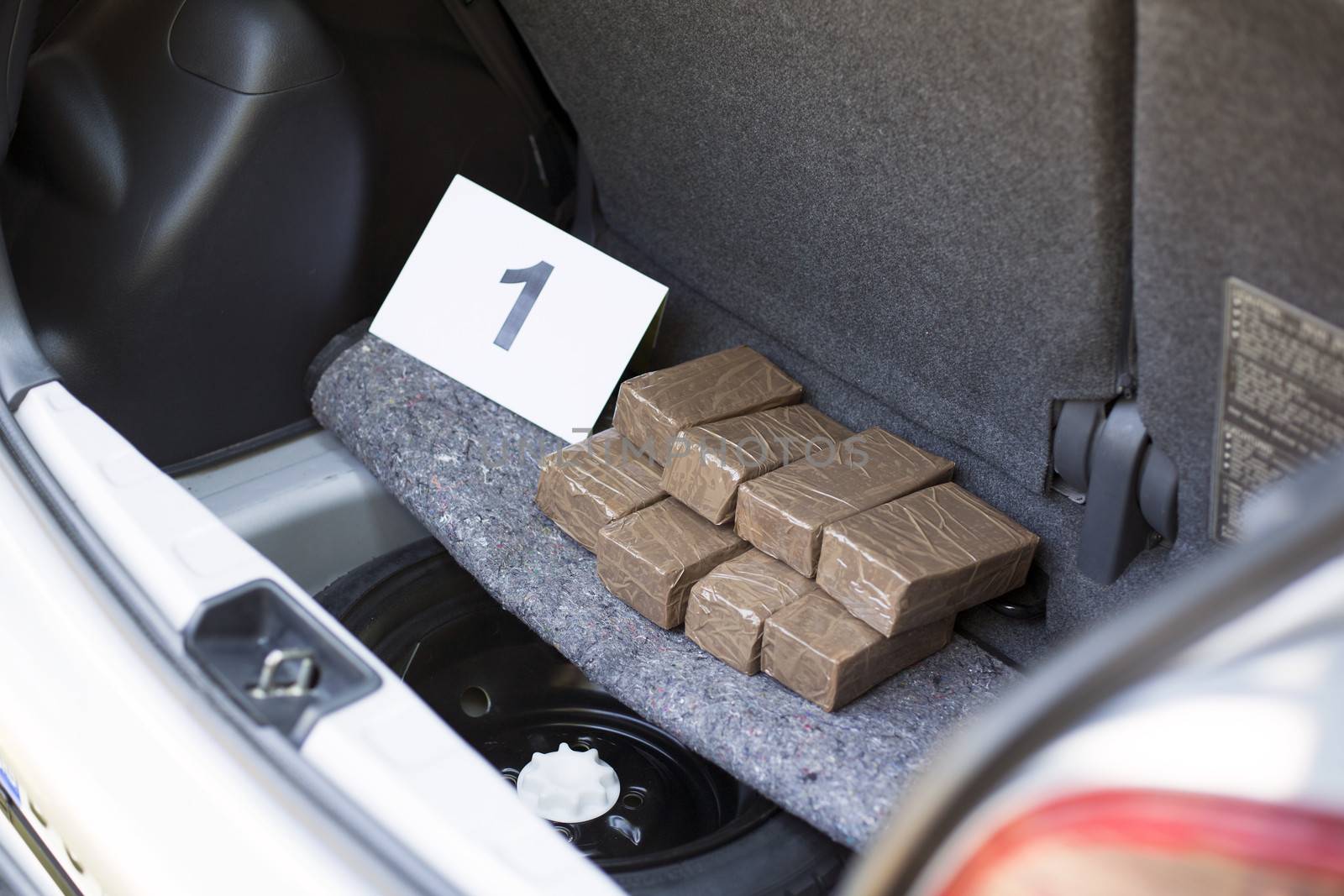 Cocaine packages in the trunk of a car