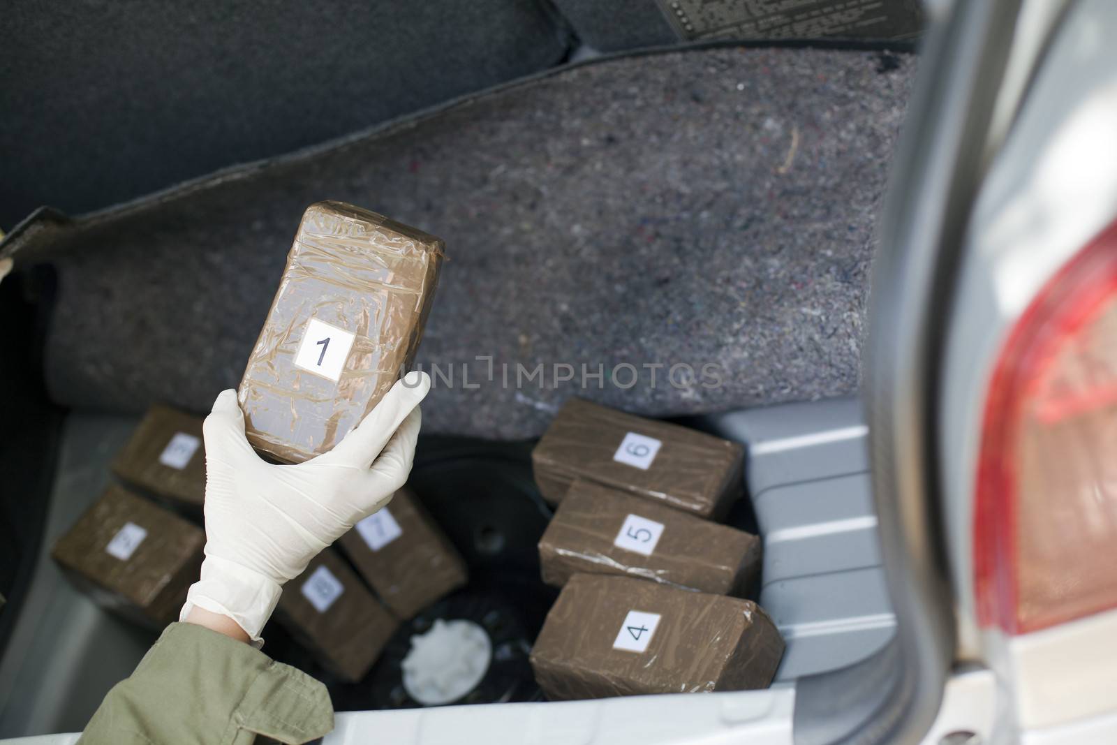 Cocaine packages in the trunk of a car