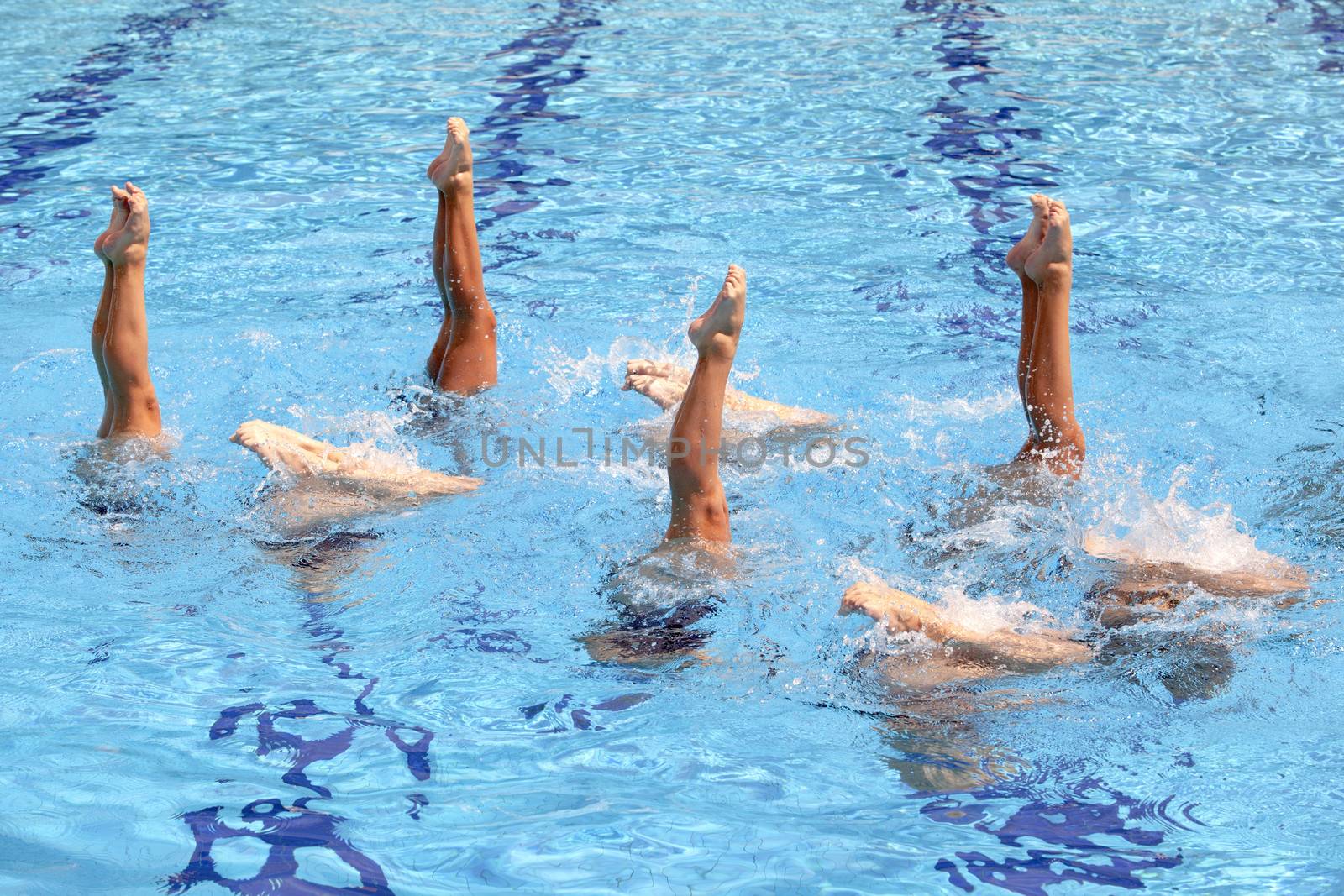 Synchronized swimmers legs movement