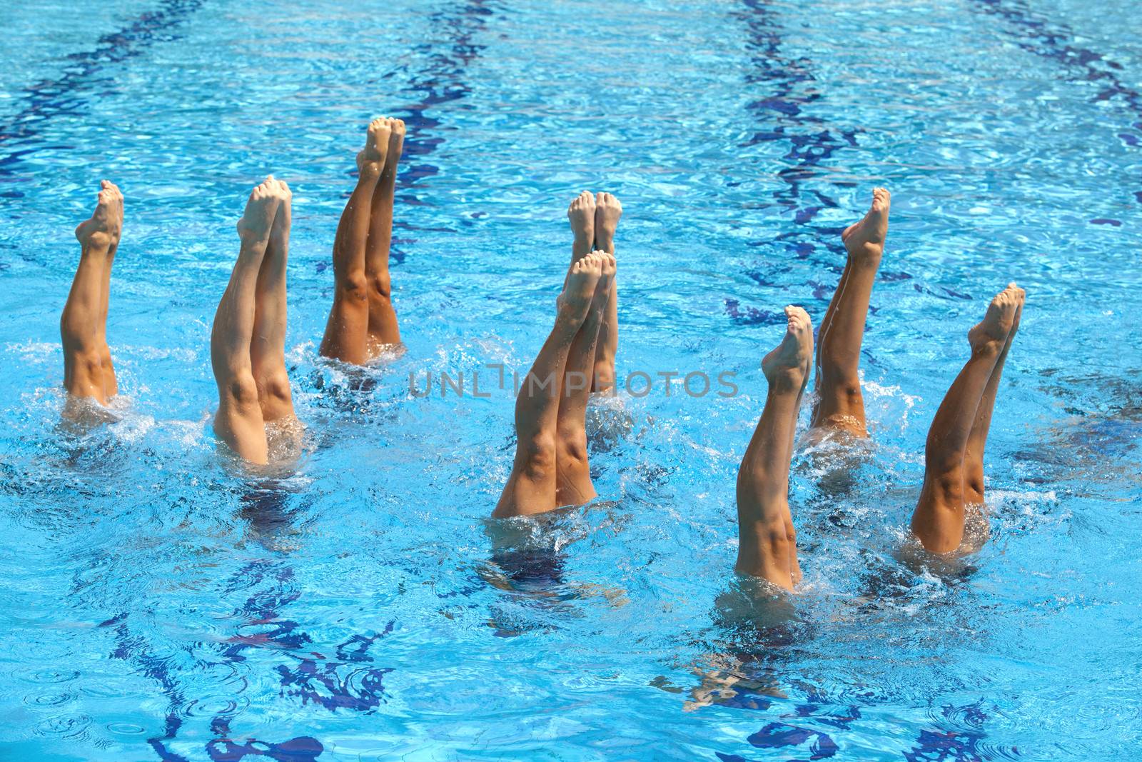 Synchronized swimmers legs movement