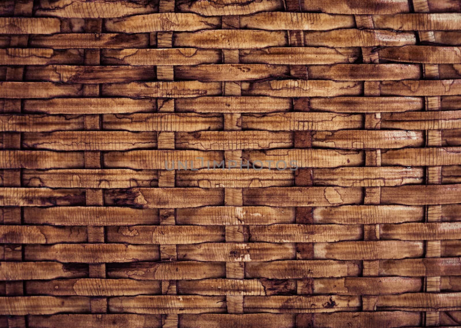 Wooden grid background of braided wood