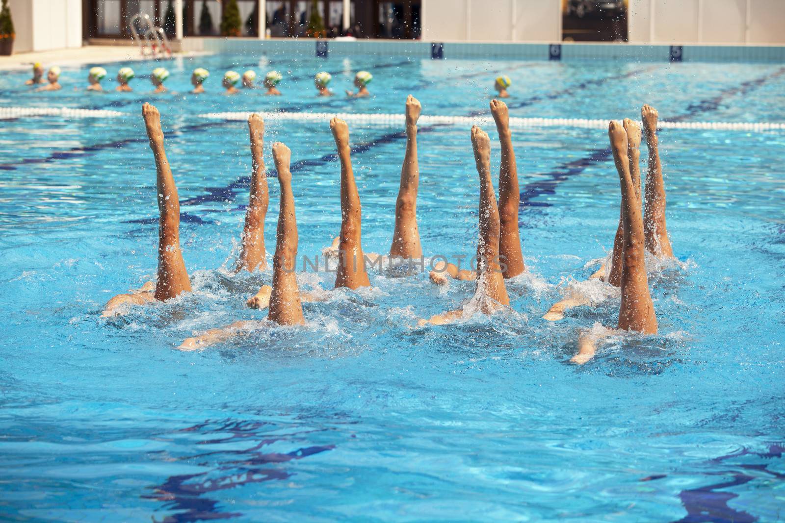 Synchronized swimmers legs movement