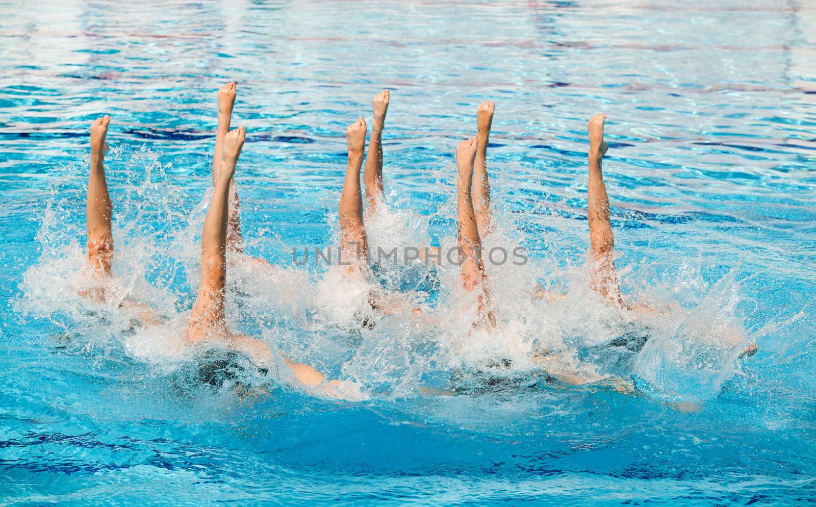 Synchronized swimmers legs movement