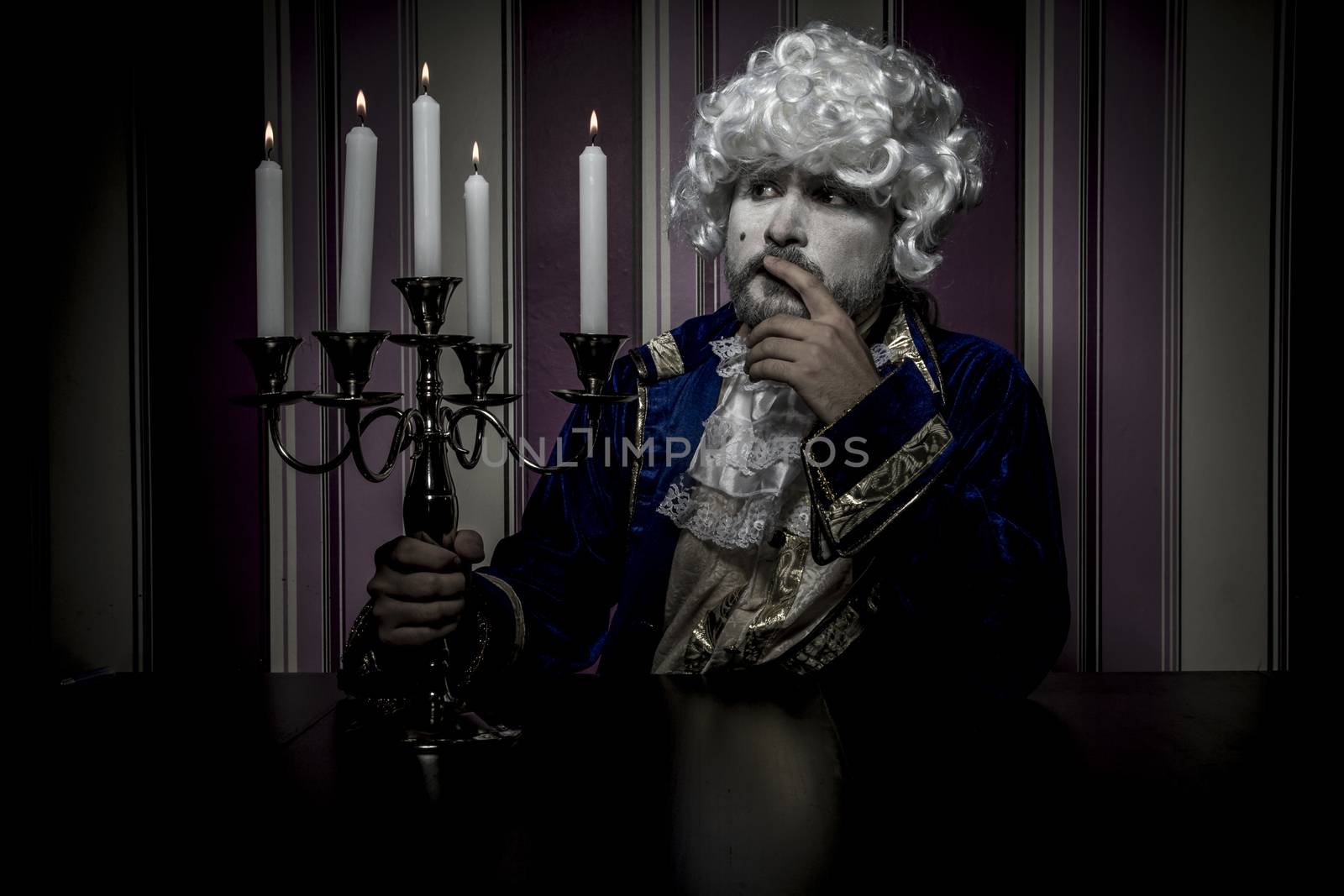 Fun, man dressed in rococo style, concept of wealth and poverty. by FernandoCortes