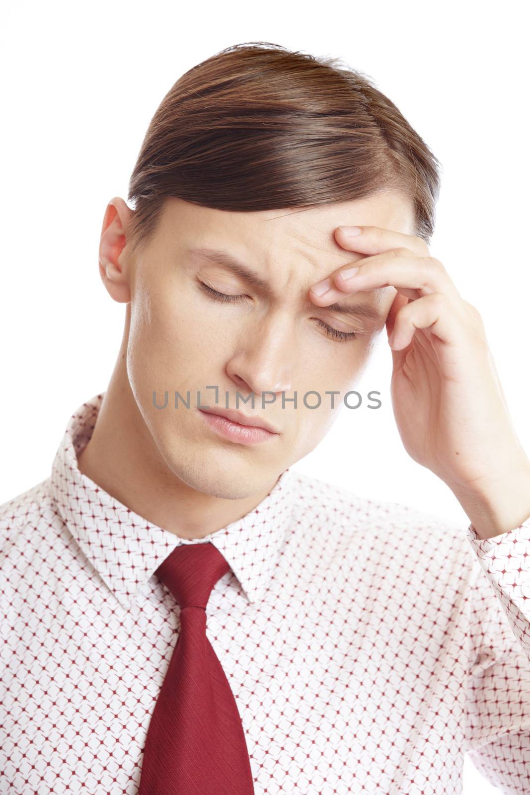 Businessman suffering from the headache and emotional stress