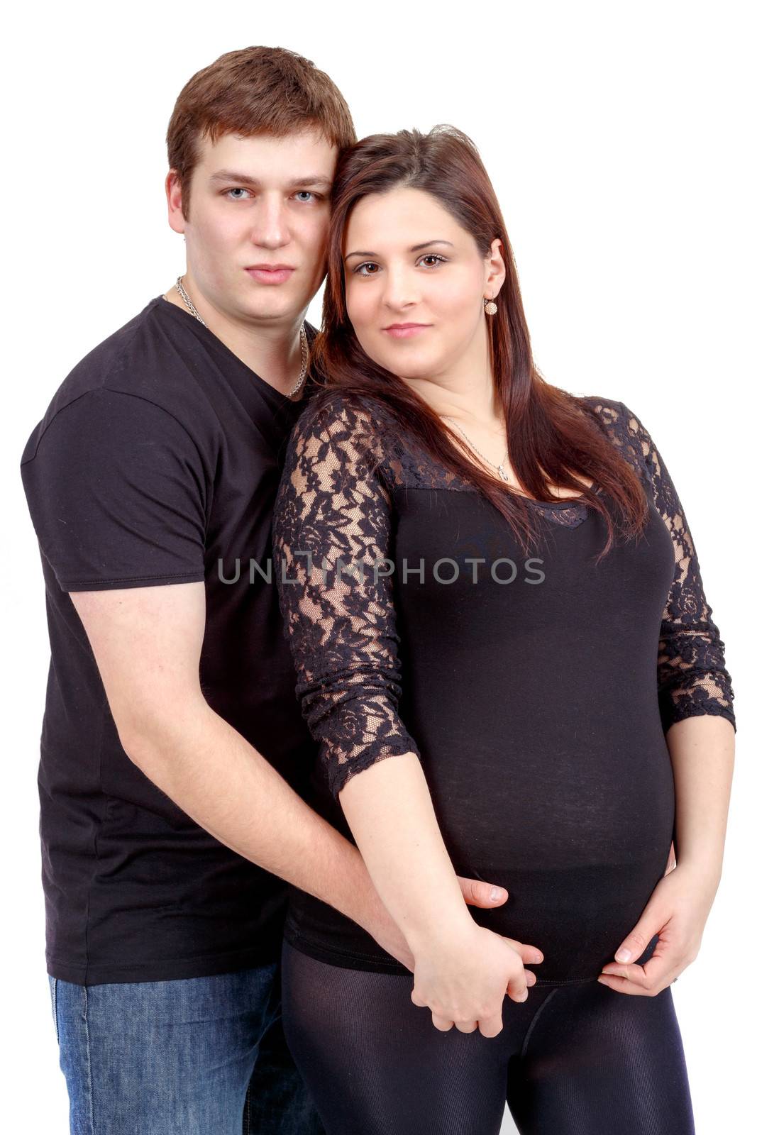 loving happy couple, pregnant woman with her husband, isolated o by artush