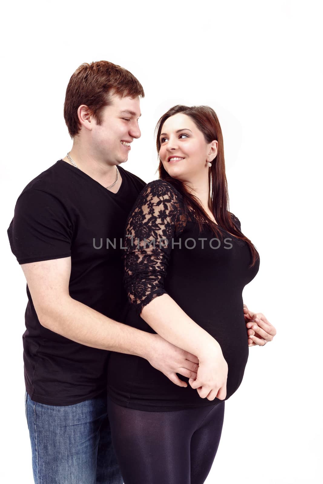 loving happy couple, smiling pregnant woman with her husband by artush